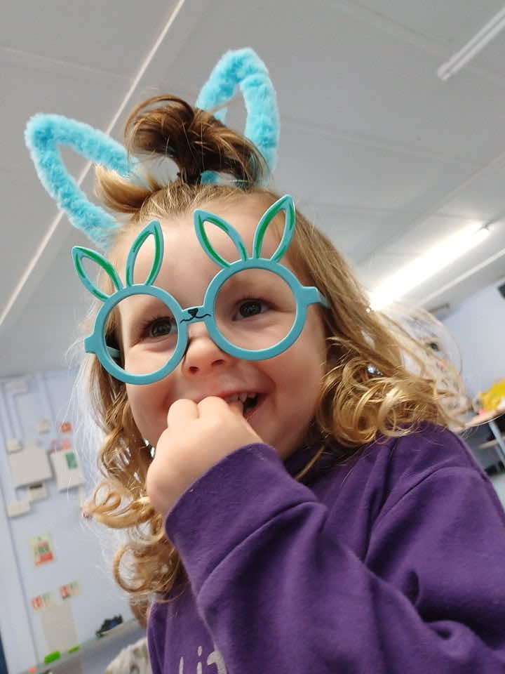 A child in bunny ears at Little Learners Aire Valley messy play class